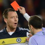 Chelsea's defender John Terry receives a red card from Turkish referee Cuneyt Cakir