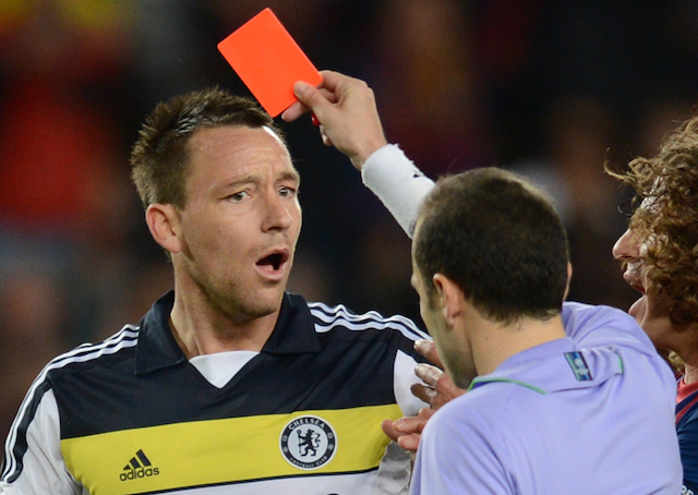 Chelsea's defender John Terry receives a red card from Turkish referee Cuneyt Cakir