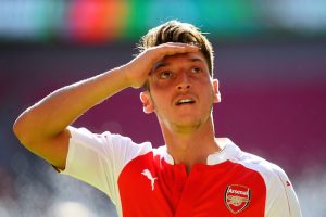 LONDON, ENGLAND - AUGUST 02: Mesut Ozil of Arsenal celebrates his team's 1-0 win after the FA Community Shield match between Chelsea and Arsenal at Wembley Stadium on August 2, 2015 in London, England. (Photo by Mike Hewitt/Getty Images)