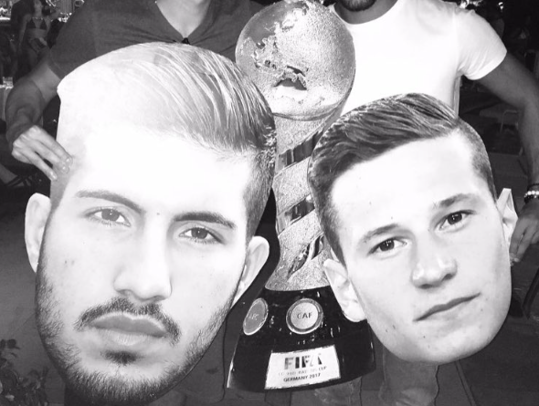 Photo: Liverpool star poses with giant cut out of himself and PSG ace Julian Draxler